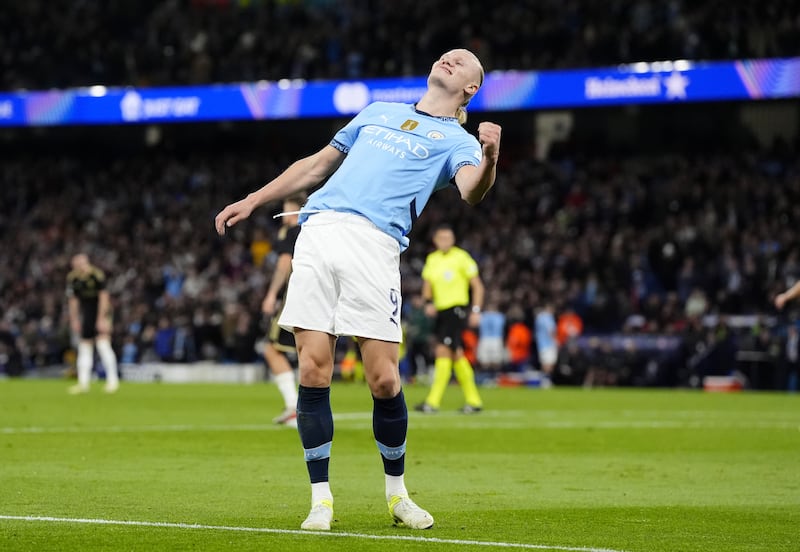 Erling Haaland celebrates scoring his side’s fourth goal