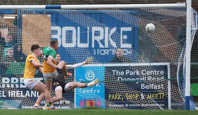 Offaly’s Anton Sullivan scores a goal  during Sunday’s Allianz Football League Division 3 match at Corrigan Park in Belfast.
PICTURE: COLM LENAGHAN