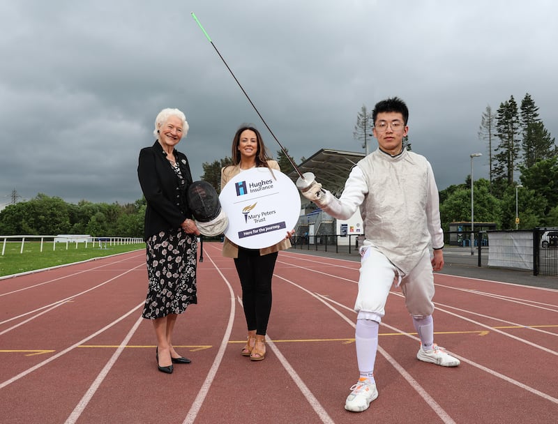 Lady Mary Peters (far left) and Emma Haughian (Hughes Insurance) wish Sean a speedy recovery