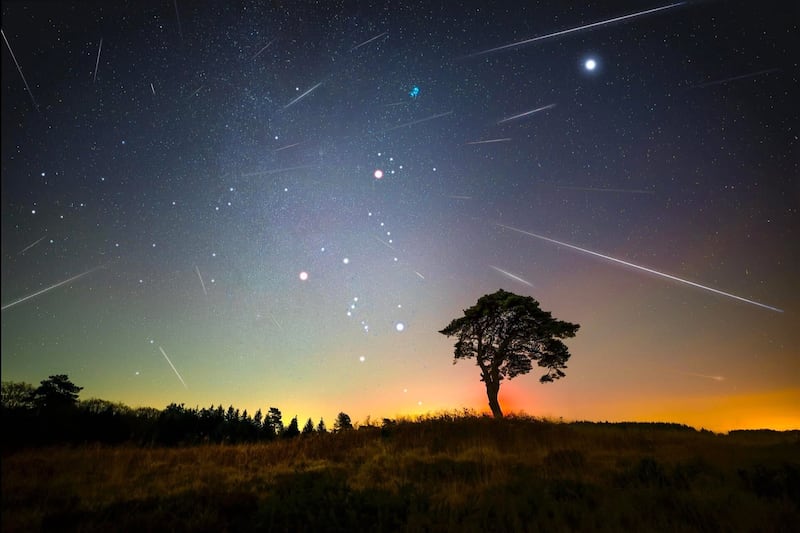 The Geminid meteor shower over Lindisfarne in Northumberland