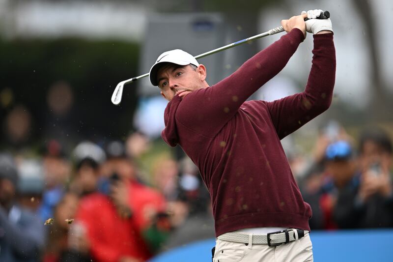 Rory McIlroy of Northern Ireland tees off on the fourth hole at Pebble Beach (Nic Coury/AP)