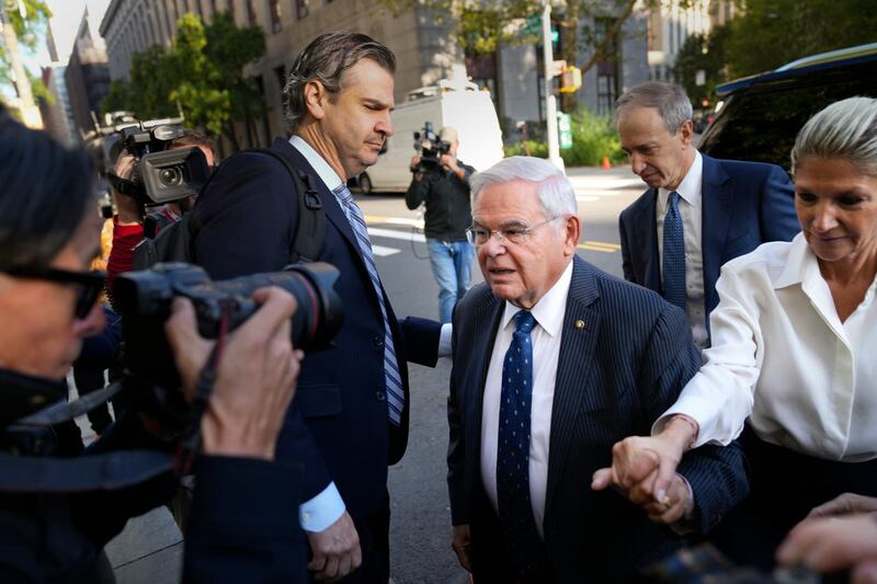 Menendez and his wife Nadine arrive at the federal courthouse in New York on Wednesday