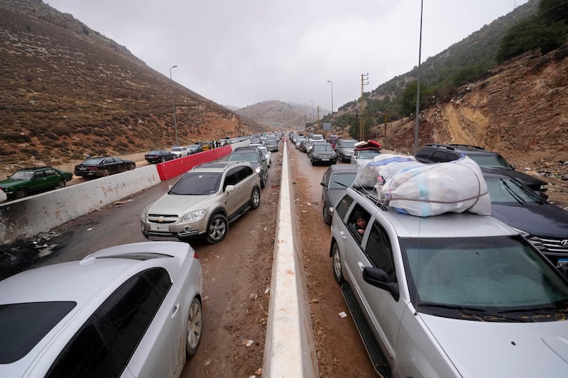 Displaced residents return from Syria following a ceasefire between Israel and Hezbollah (Hassan Ammar/AP)