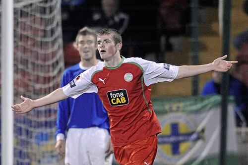 Rory Donnelly rejoins Cliftonville on three-year deal 