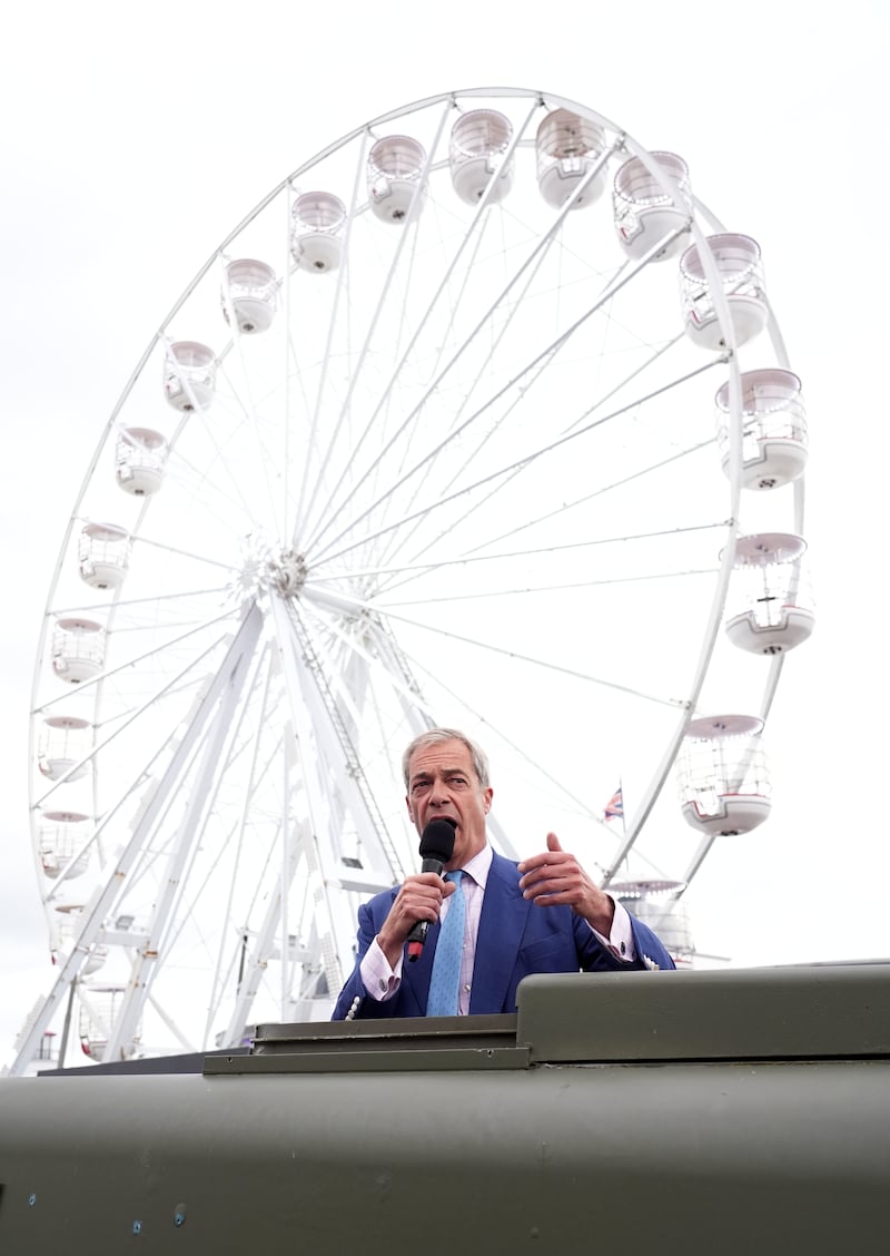 Reform UK leader Nigel Farage gives a speech to supporters on Clacton Pier in Essex, while on the General Election campaign trail
