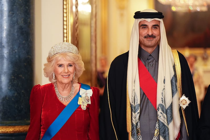 Queen Camilla with the Emir of Qatar Sheikh Tamim bin Hamad Al Thani ahead of a state banquet at Buckingham Palace