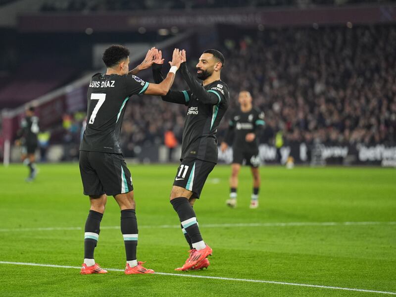 Luis Diaz, left, celebrated with Mohamed Salah after scoring Liverpool’s opening goal