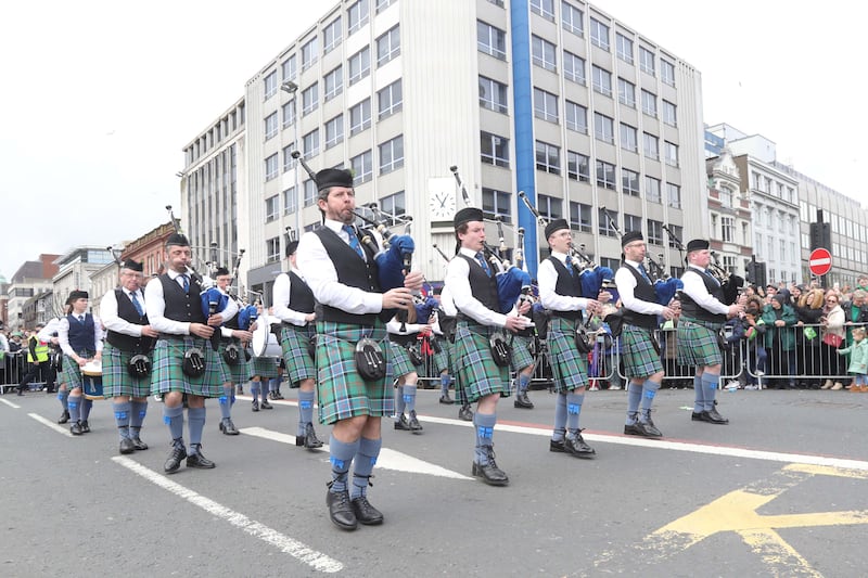 Performers entertain the crowd as  Thousands line the streets for the St Patrick’s day Parade in Belfast on Sunday.
PICTURE COLM LENAGHAN