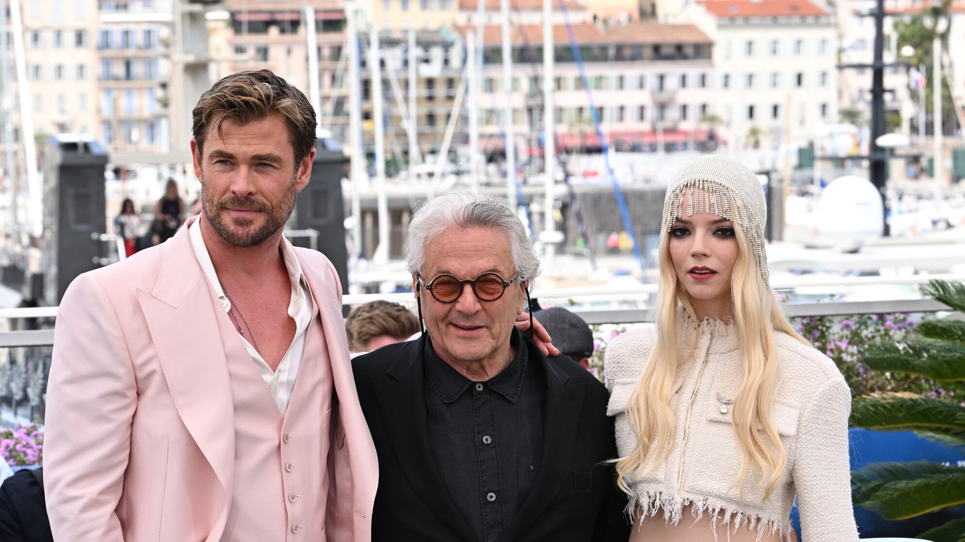 Chris Hemsworth, George Miller and Anya Taylor-Joy attend the Furiosa photocall during the 77th Cannes Film Festival