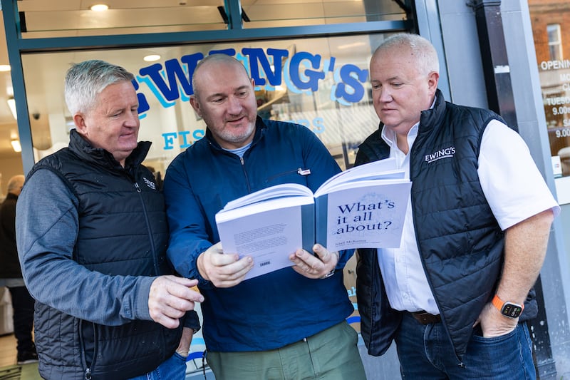 Warren Ewing, Niall McKenna and Crawford Ewing outside Ewing’s fishmongers in Belfast. Ewing’s fish features heavily in Niall’s new cookbook, What’s it all About?