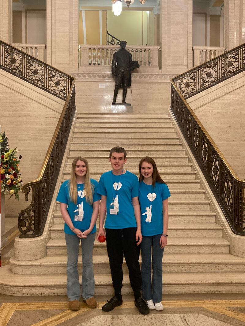 Caleb and his two sisters at Stormont