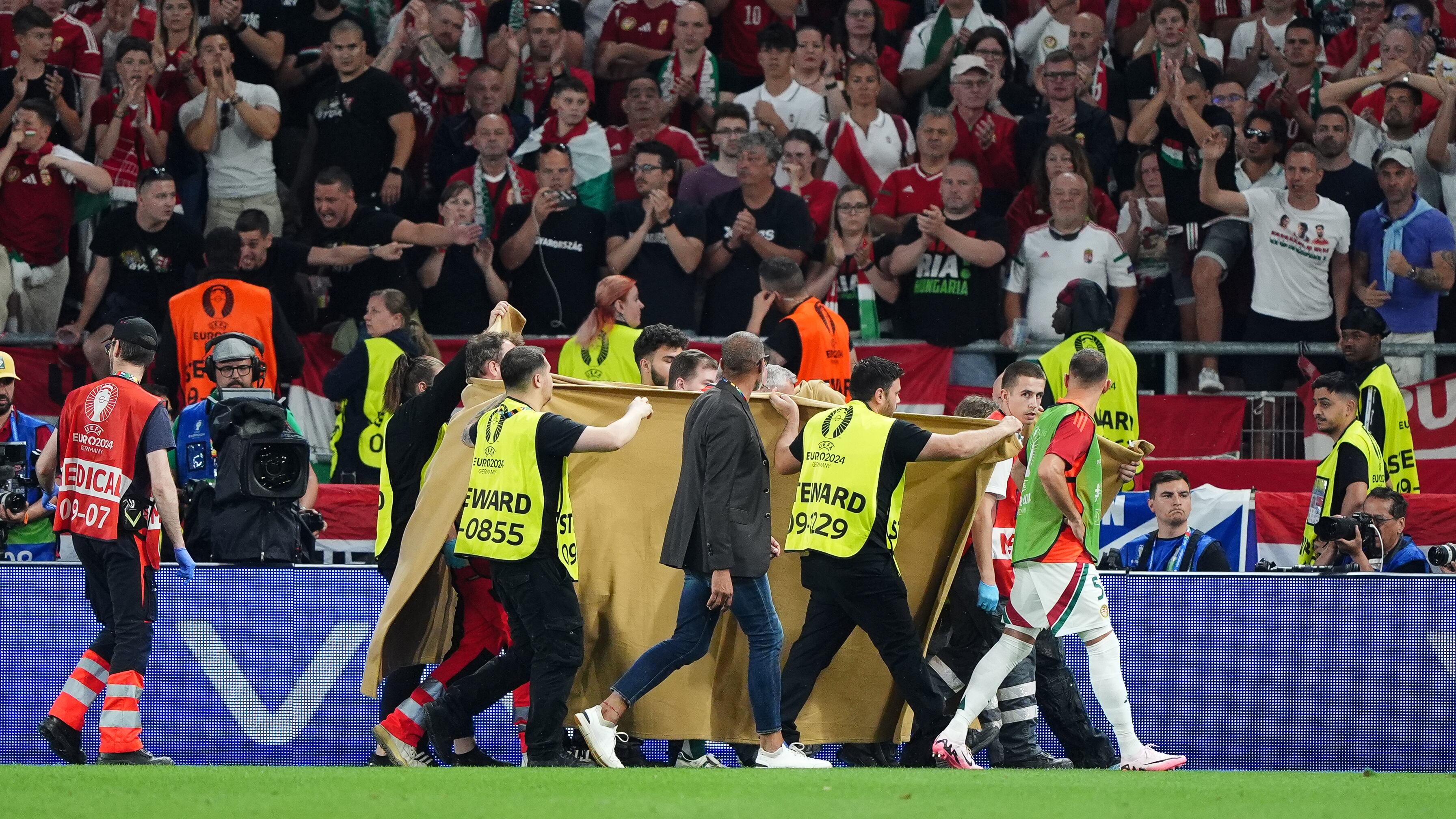 Hungary’s Barnabas Varga is taken from the pitch on a stretcher