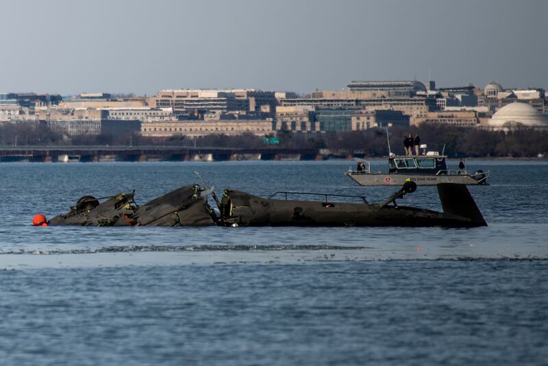 Wreckage is seen in the Potomac River near Ronald Reagan Washington National Airport (US Coast Guard via AP)