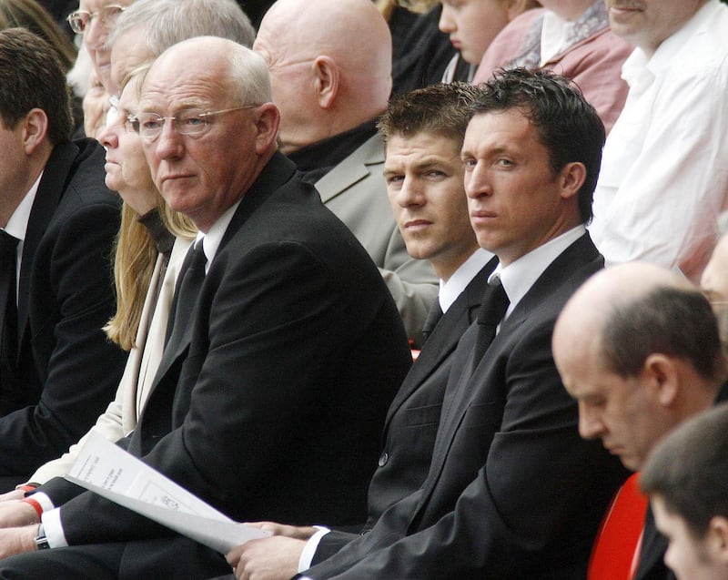 Phil Hammond (left) with Liverpool players Steven Gerrard (centre) and Robbie Fowler at a memorial service at Anfield on the 17th anniversary