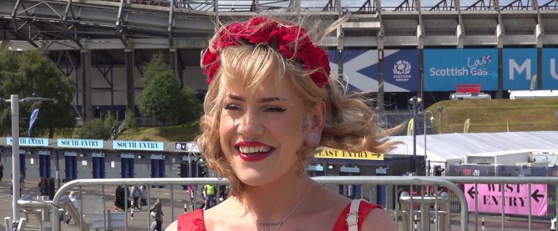 Lifelong Taylor Swift fan Meaghan Grattan, 26s, sports a red dress inspired by