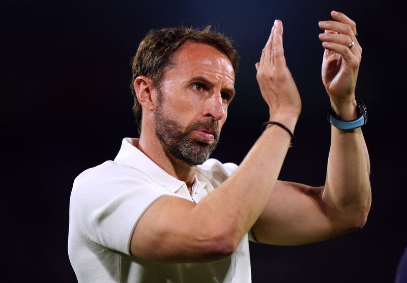 England manager Gareth Southgate applauds fans after the final whistle against Slovenia