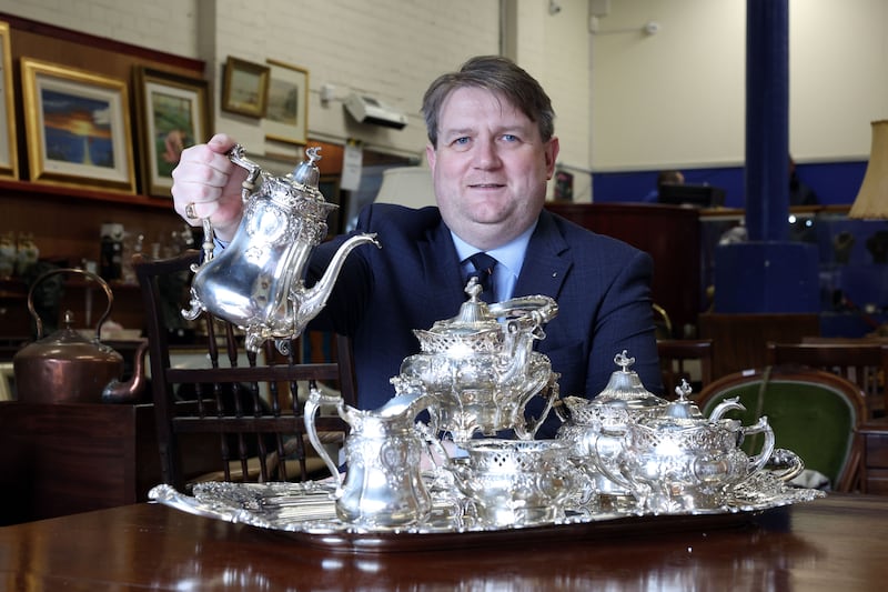 Karl Bennett with seven piece silver tea service used to entertain the Duke of Edinburgh