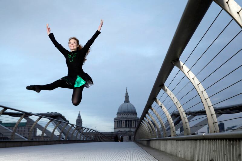 Irish dancers perform on London's Millennium Bridge (Tim Ireland/PA)