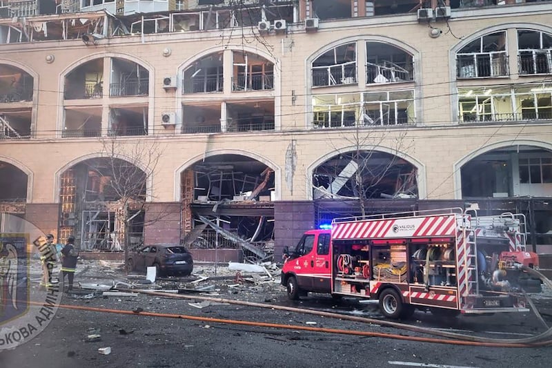 Firefighters work at a site after a Russian missile attack in Kyiv, Ukraine (AP)