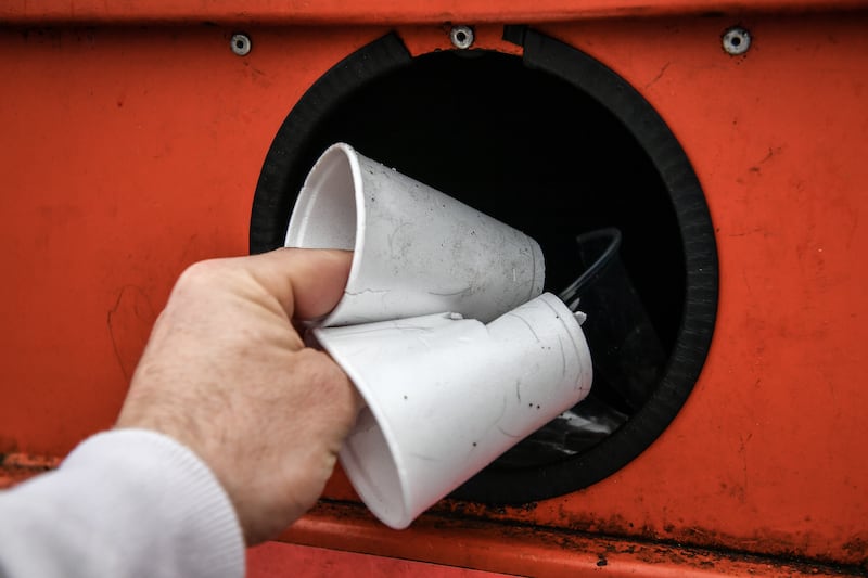 Disposable drinking cups are deposited at a plastic recycling centre