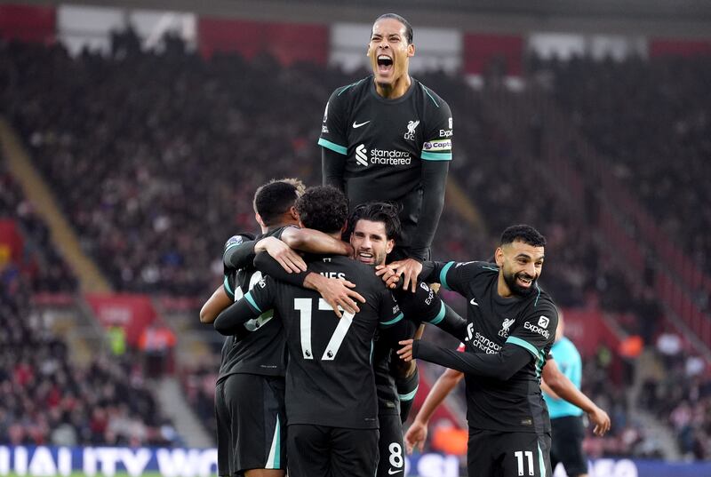 Dominik Szoboszlai (centre) celebrated scoring Liverpool’s first goal