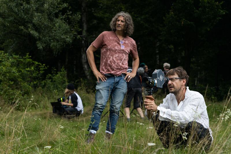 Jonathan Glazer with cinematographer Lukasz Zal on the set of The Zone Of Interest (A24/AP)