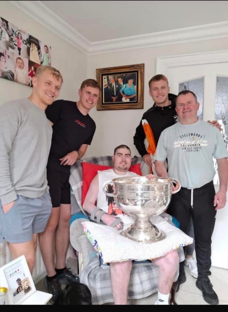 Cian McConville, Oisin O'Neill and Rian O'Neill with Caolan Finnegan and his dad