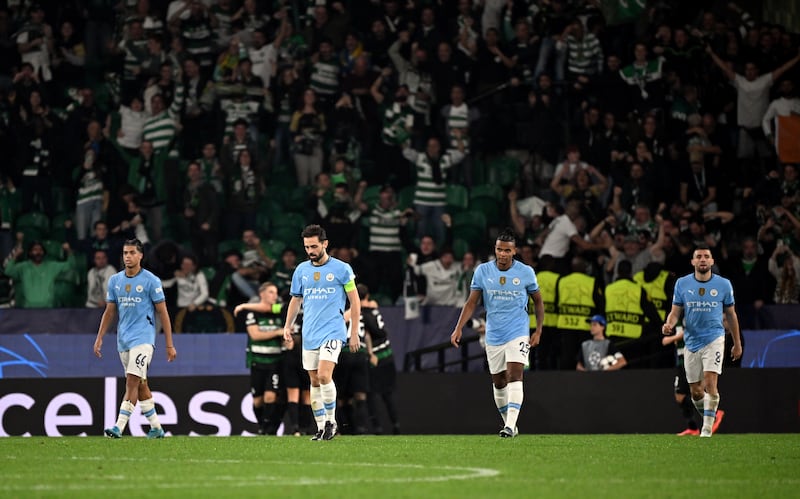 Bernardo Silva (centre left) and his Manchester City team-mates endured a difficult night in Portugal .