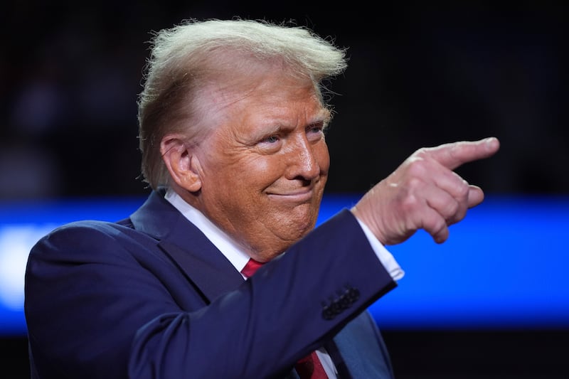 Former president Donald Trump speaks at a campaign rally at Van Andel Arena in Grand Rapids, Michigan (Evan Vucci/AP)