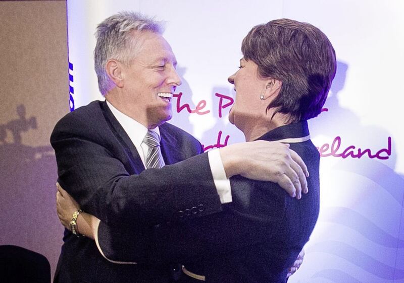 Peter Robinson embraces Arlene Foster after she was formally elected as leader of the DUP in 2015.  Picture by Liam McBurney/PA Wire 