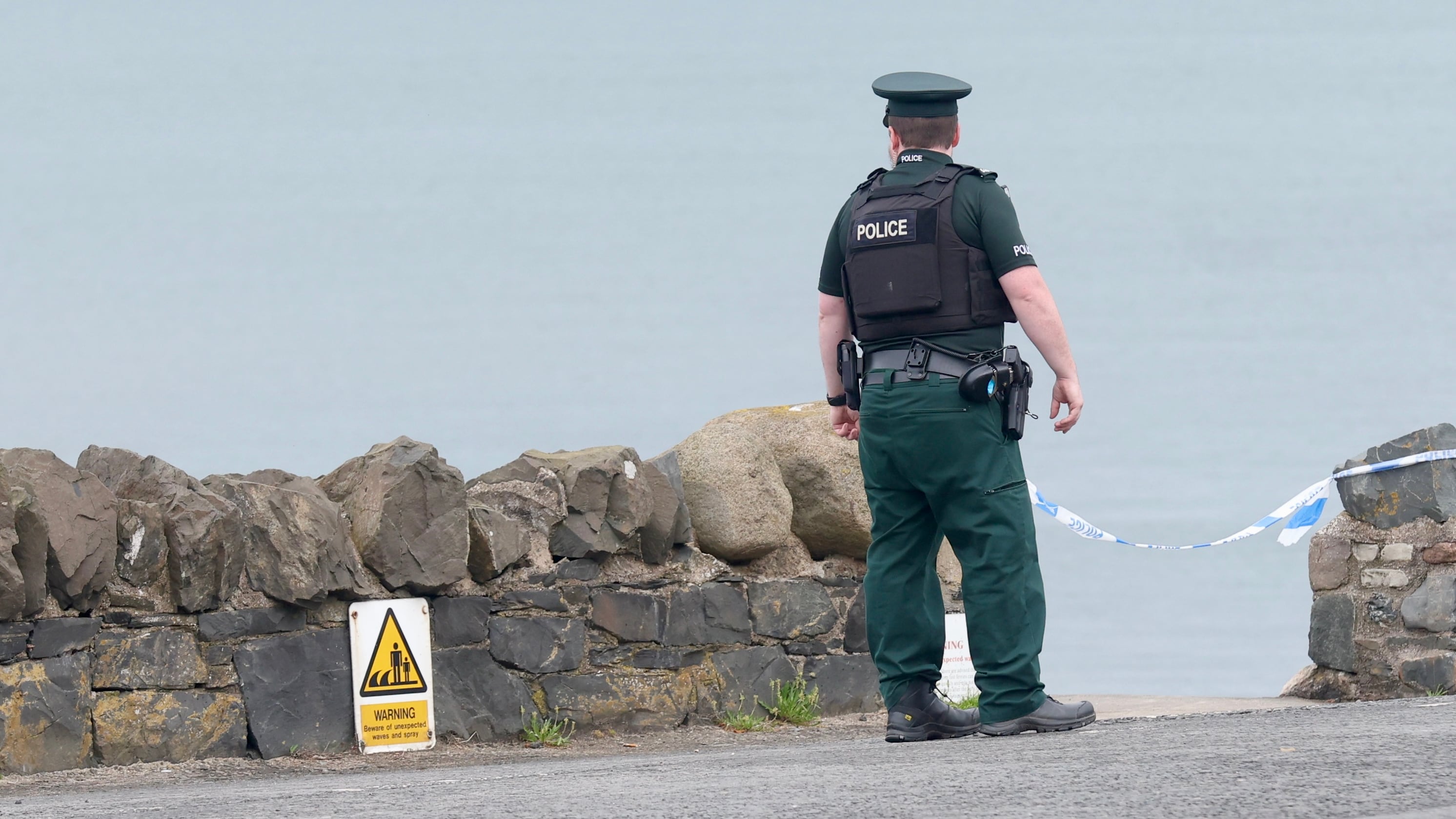 Police at the scene after a woman’s body was found on a beach in Cultra.
PICTURE COLM LENAGHAN