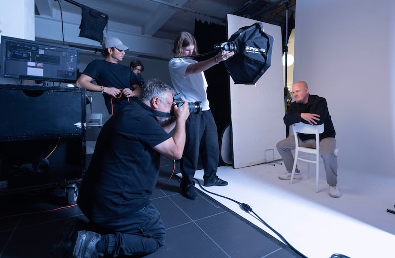 Rankin takes a picture of Matt Evans, aged 44, from Barry in Wales, who is one-of-thirty millionaires selected to have their portrait taken by Rankin