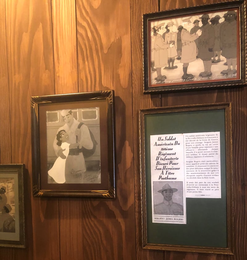 Photographs and newspapers articles in the queue of the Tiana’s Bayou Adventure attraction at Walt Disney World in Florida