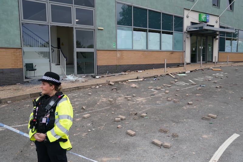 Police guarding the Holiday Inn Express in Tamworth a day after it was attacked