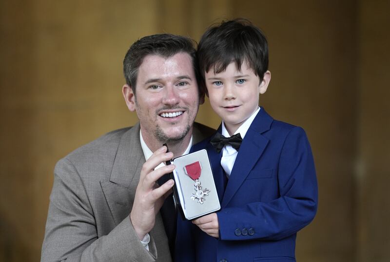 Chef Adam Handling with his son Oliver, after being made an MBE by the King