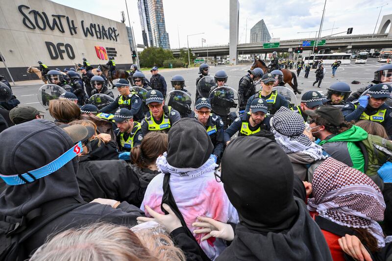 Police clash with anti-war protesters outside the military arms convention (Joel Carrett/AAP Image/AP)