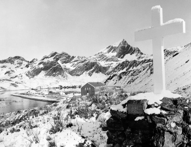 The Memorial Cross to Sir Ernest Shackleton at Hope Point, South Georgia, overlooking the British Antarctic Survey’s Grytviken station