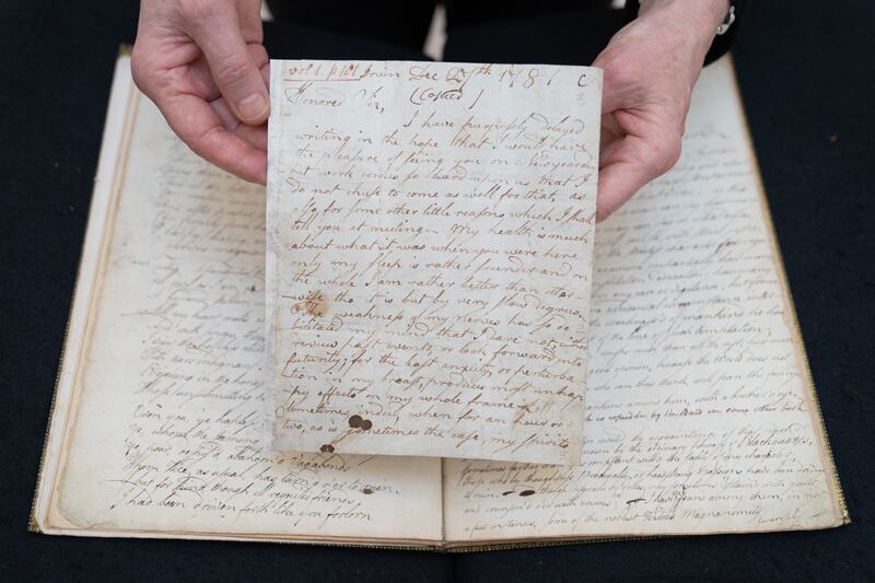 A letter written by Robert Burns to his father which forms part of the Honresfield Library collection, on display at Sotheby’s in London