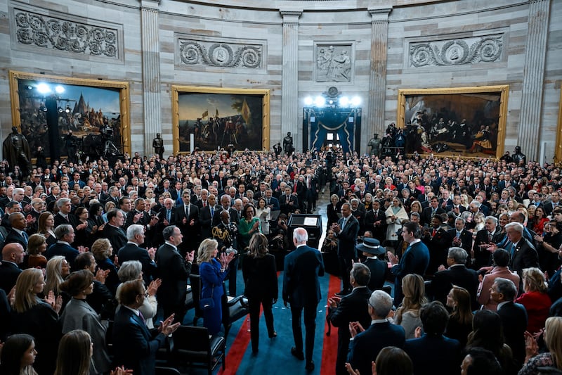 President Joe Biden, bottom right, and vice president Kamala Harris arrive at the 60th Presidential Inauguration in the Rotunda of the US Capitol (Kenny Holston/The New York Times via AP)