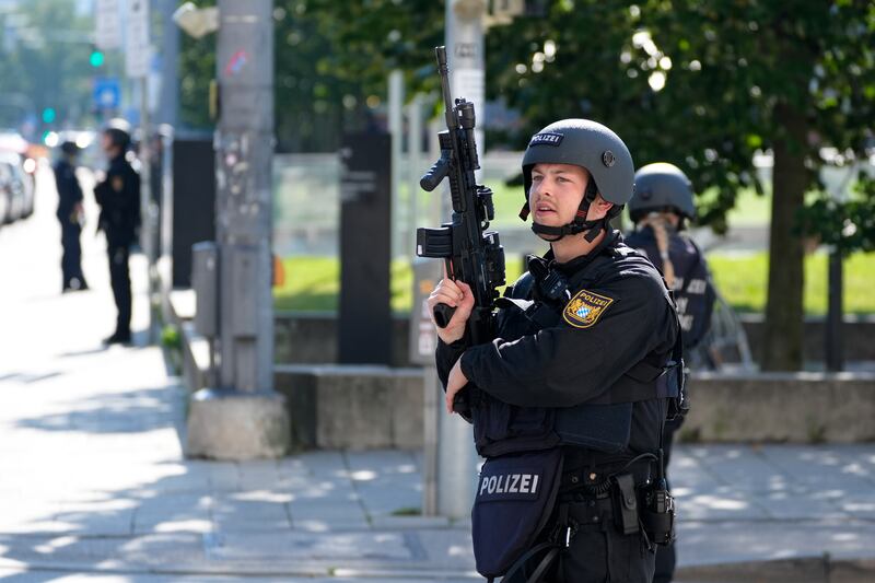 Police officers near the scene after officers fired shots at a suspicious person near the Israeli Consulate and a museum on the city’s Nazi-era history in Munich (Matthias Schrader/AP)