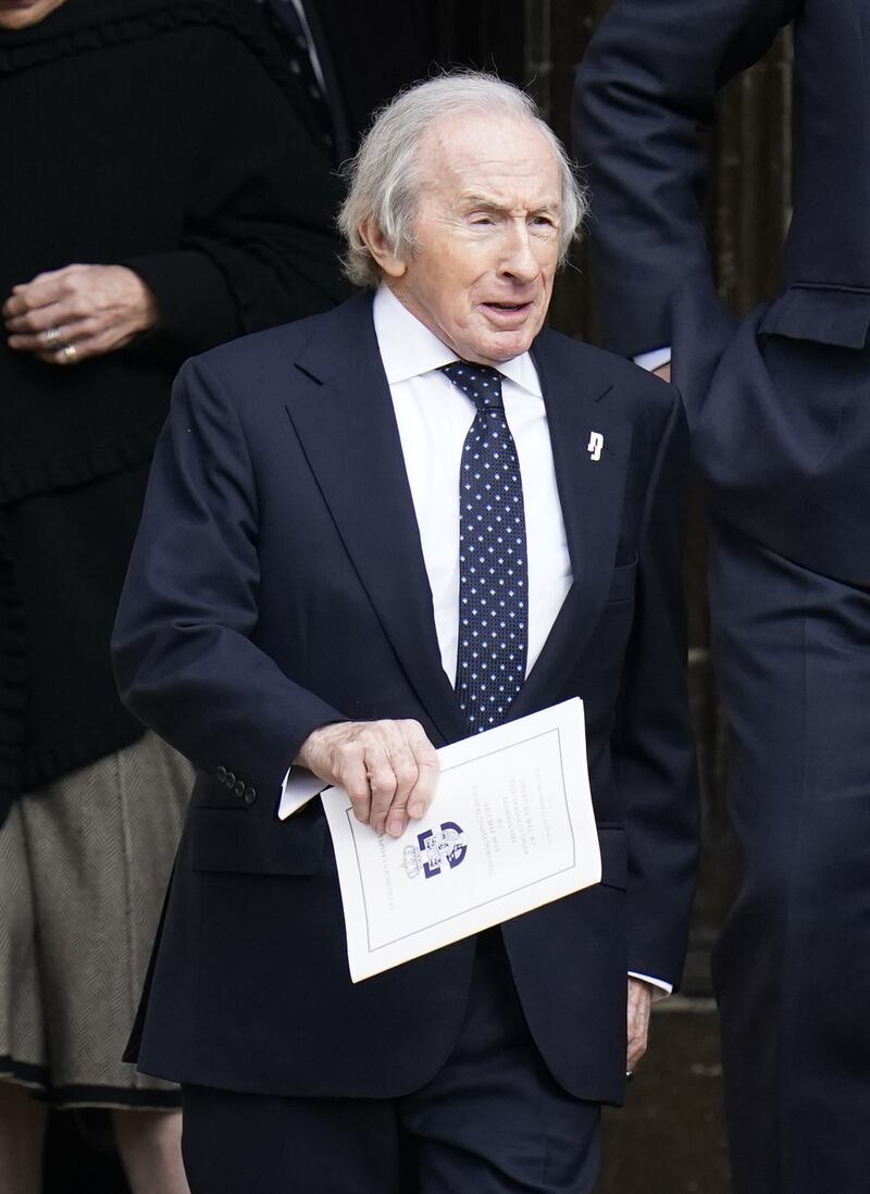 Sir Jackie Stewart leaves the thanksgiving service