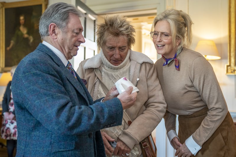 Alan Titchmarsh, left, with Sir Rod Stewart and Penny Lancaster during the reception