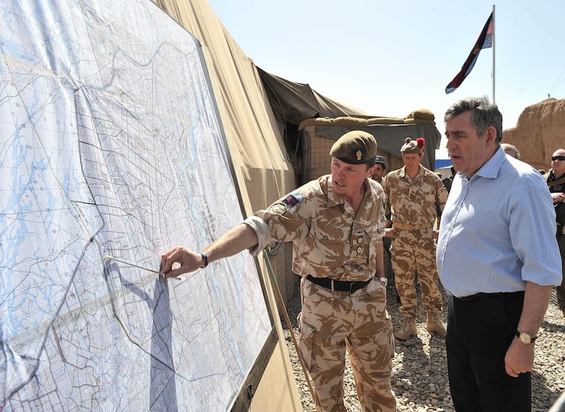 Then-prime minister Gordon Brown with then-lieutenant colonel Roly Walker in Afghanistan in 2010