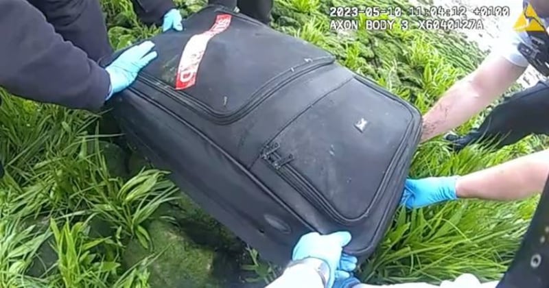 Video grab of police body-worn video footage of a recovered suitcase containing the decomposed body of Suma Begum
