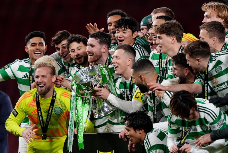 Celtic players celebrate winning the Premier Sports Cup final at Hampden