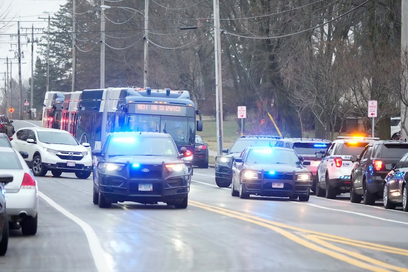 Emergency vehicles outside the Abundant Life Christian School in Madison (Morry Gash/AP)