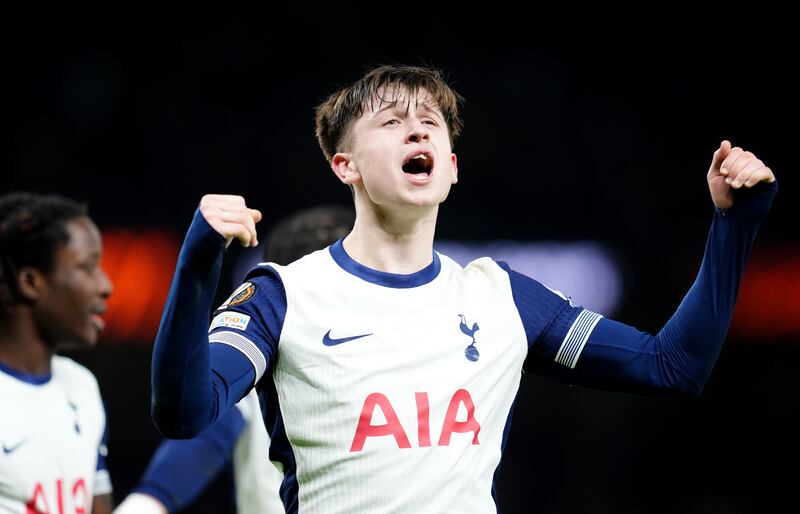 Mikey Moore celebrates scoring Tottenham’s third goal