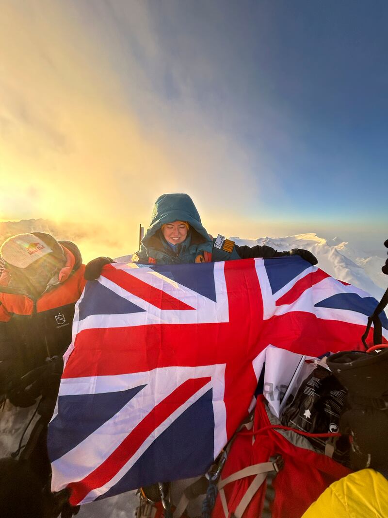 Adriana Brownlee completed her record-breaking bid earlier this month after climbing Mount Shishapangma in China (AGA Adventures via AP)