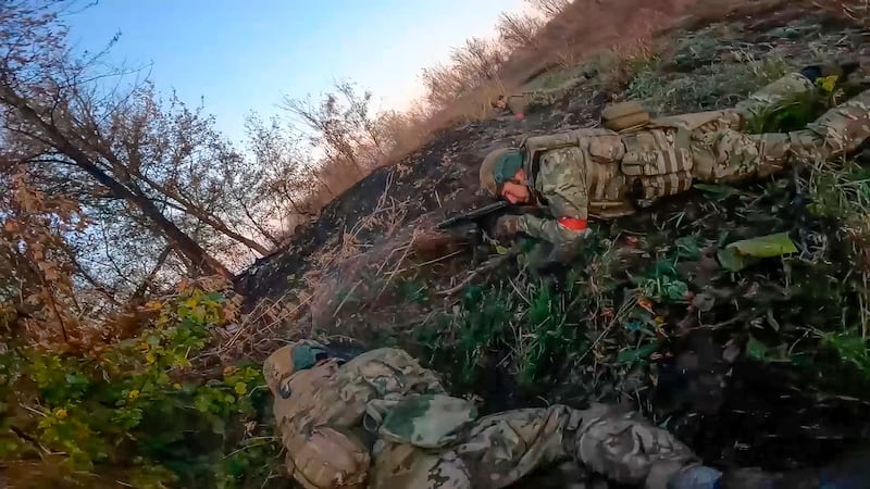 Russian soldiers target Ukrainian armed forces in the Sudzhansky district of the Kursk region of Russia (Russian Defence Ministry Press Service/AP)