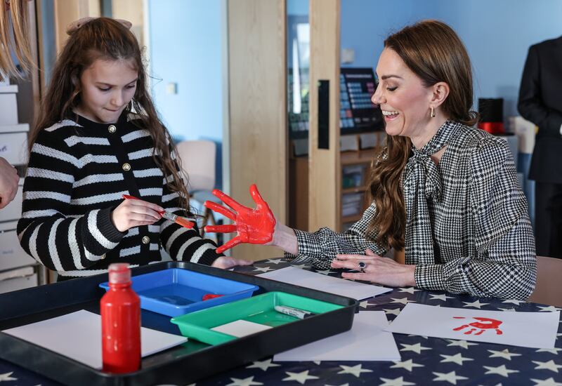 Instead of unveiling a plaque, the Princess of Wales had her hand painted and added her handprint to the hospice’s wall